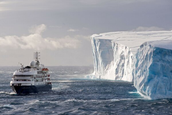 Liner on the background of a huge block of ice