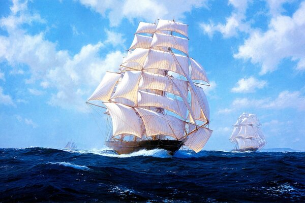 A white sail in the blue sky