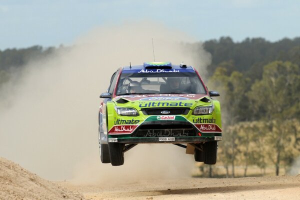 Flying car on the background of dust clouds