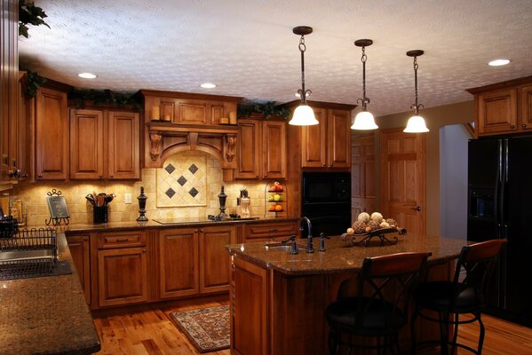 Cozy atmosphere of the bar counter in the middle of the kitchen