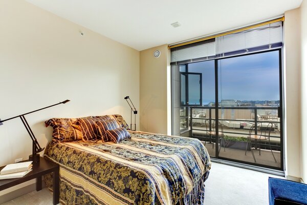 Interior of the bedroom with access to the balcony