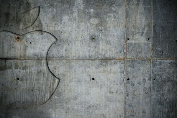 Engraving of a bitten apple on a gray background