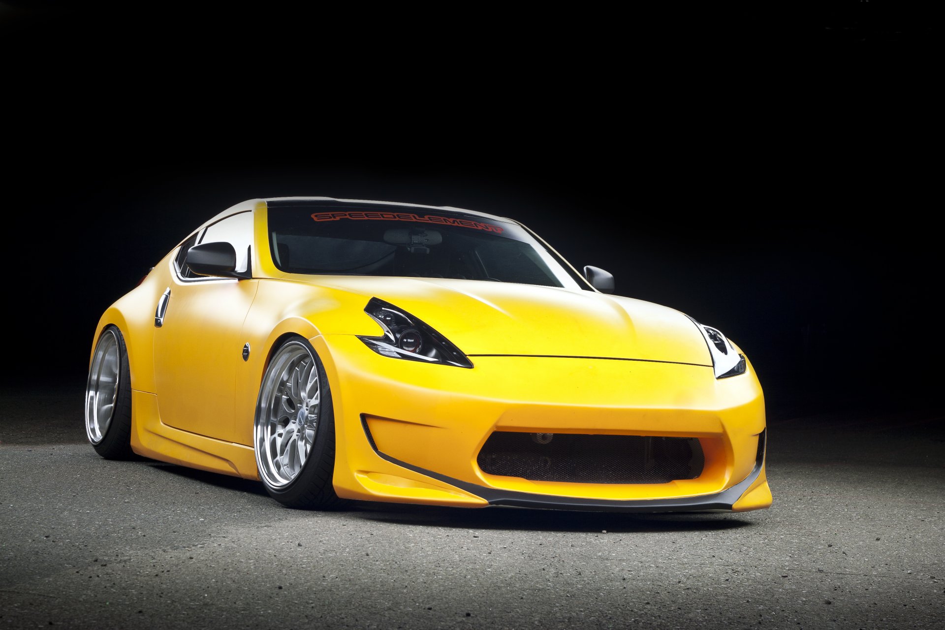 nissan 370z amarillo frente nissan