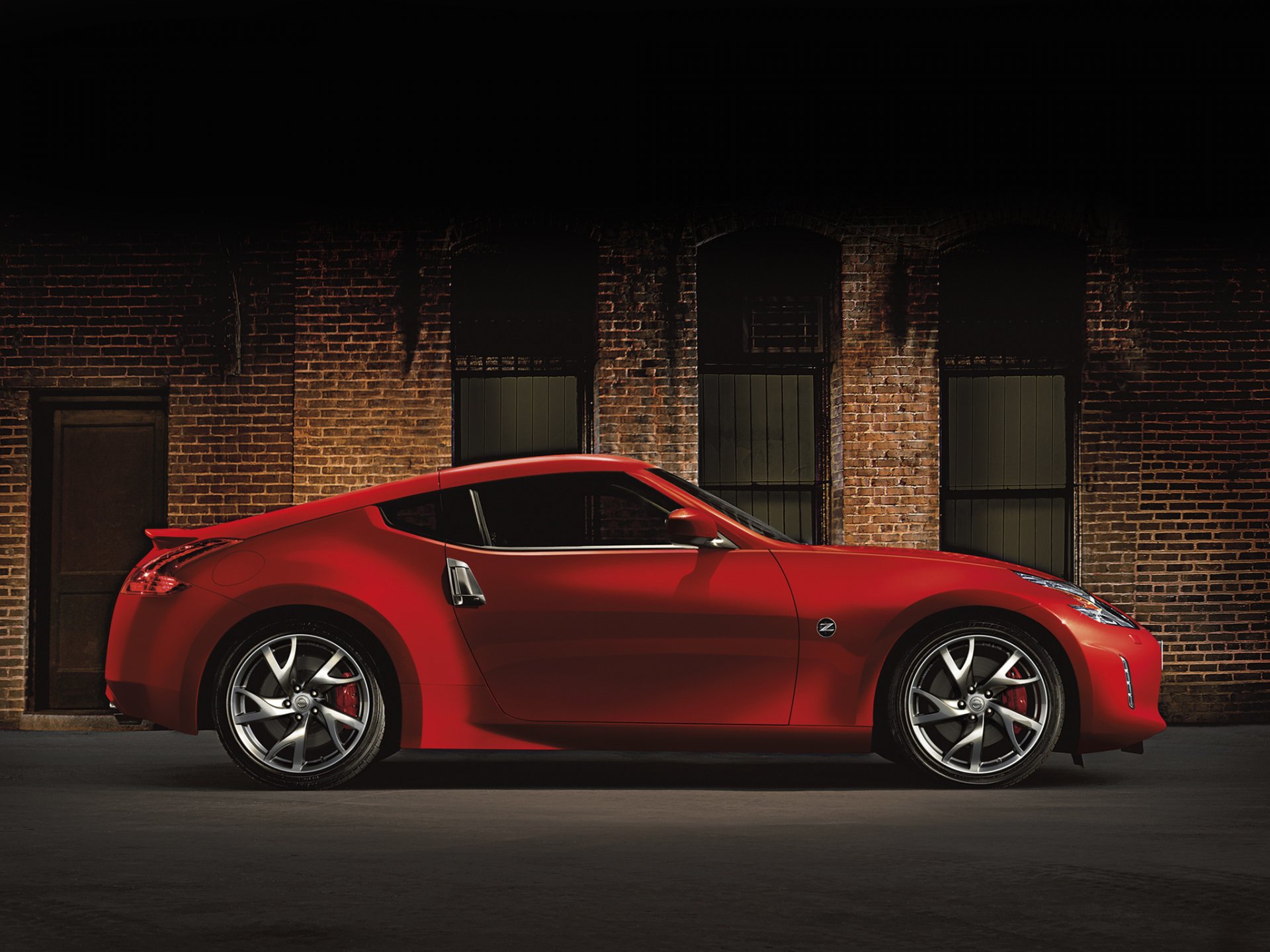 car car nissan red building side view cars nissan 370z red