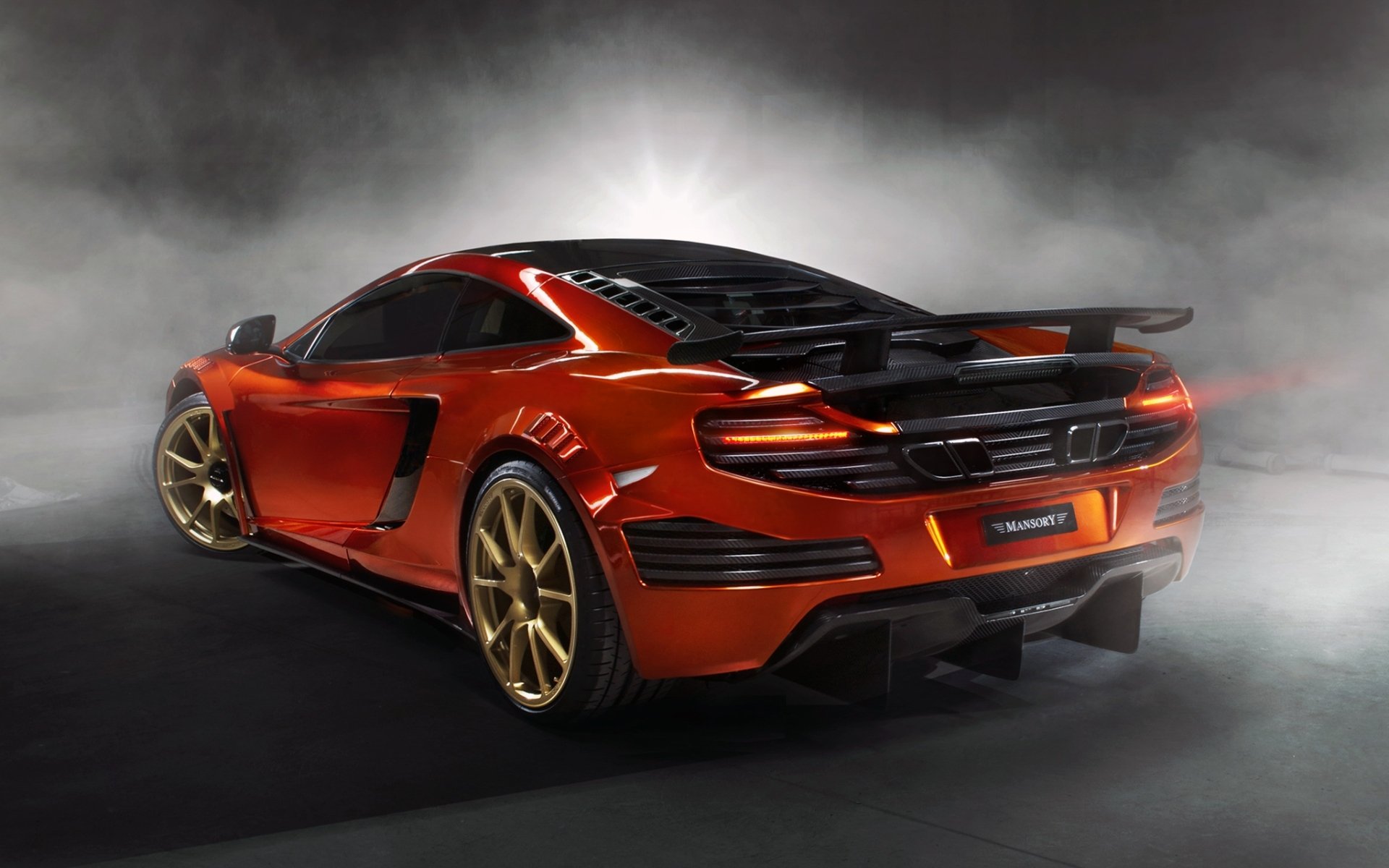 mansory mclaren mp4-12c mclaren supercar orange rear view tuning smoke background