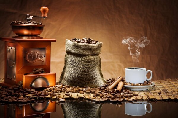 Coffee, coffee grinder, cup of fragrant coffee