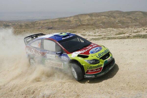 Ford participates in the rally raising dust