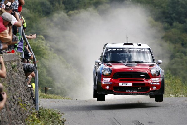 Mini Cooper rushes along the highway