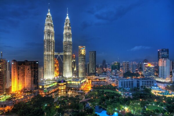 Lights of tall towers at night in Malaysia