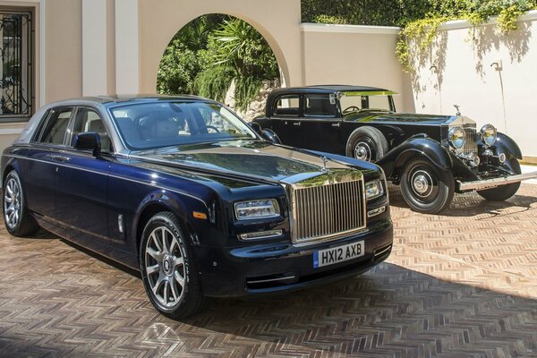 Two cars parked at a private house