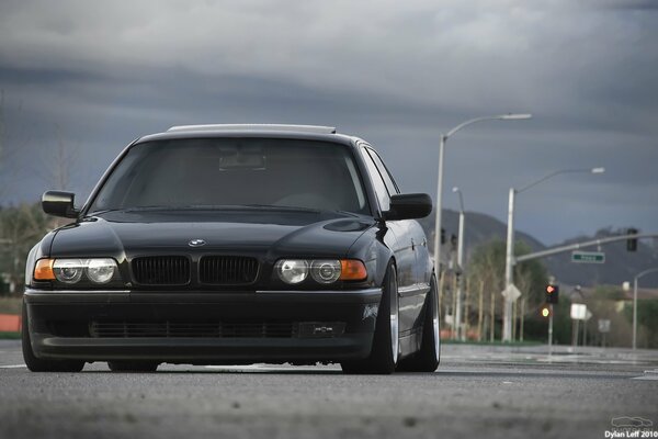 Ntysq BMW 740 moving on the road