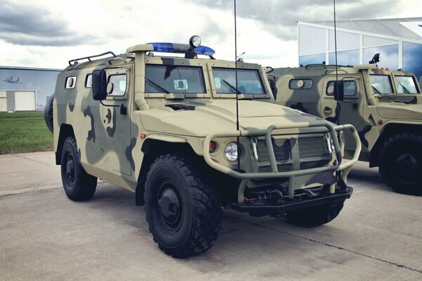 Parking of armored vehicles with camouflage coating