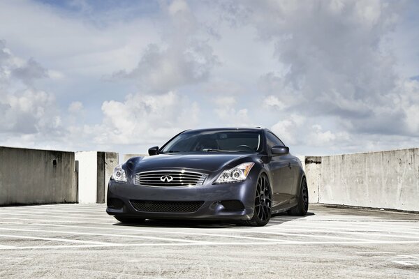 Infiniti coupe. a black car on a gray background