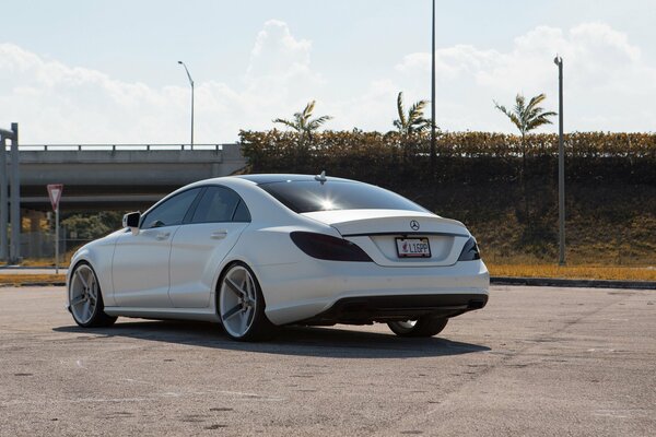 White tuned Mercedes on big wheels