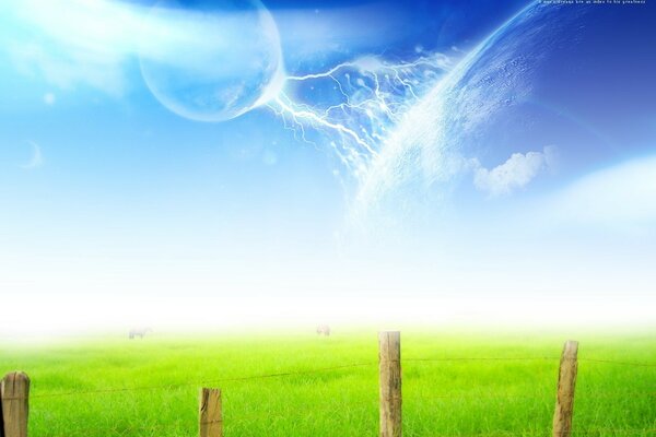 Fenced green field and sky with a planet