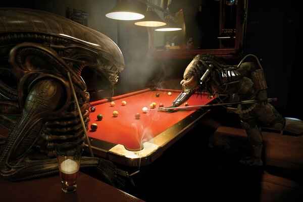 Two alien predators are playing billiards