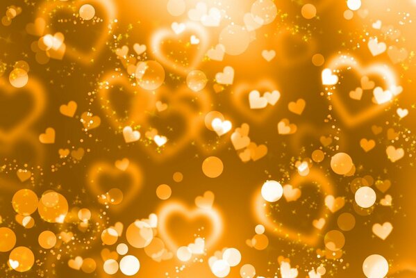 Golden hearts on a golden background