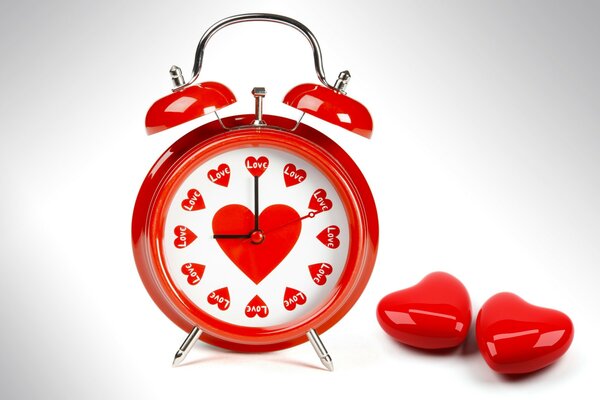 The alarm clock shows the time for love