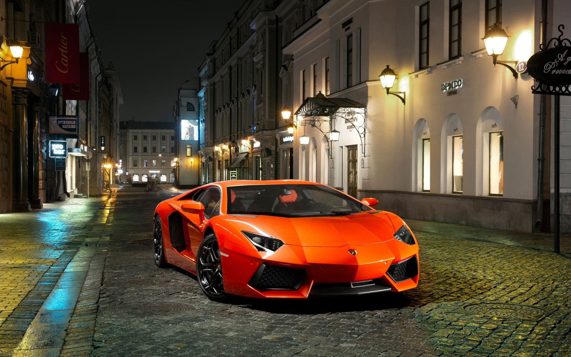 lamborghini aventador lp700-4 orange sports car street night buildings front