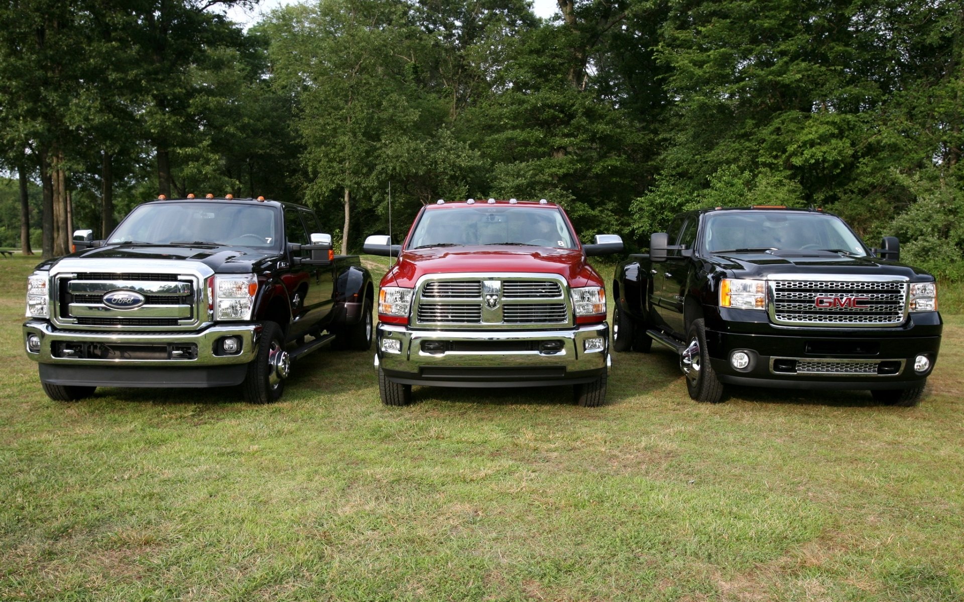 ford f450 super duty and dodge ram heavy duty crew cab gmc sierra denali hd ta dodge jeep pickup jeep front end trees background