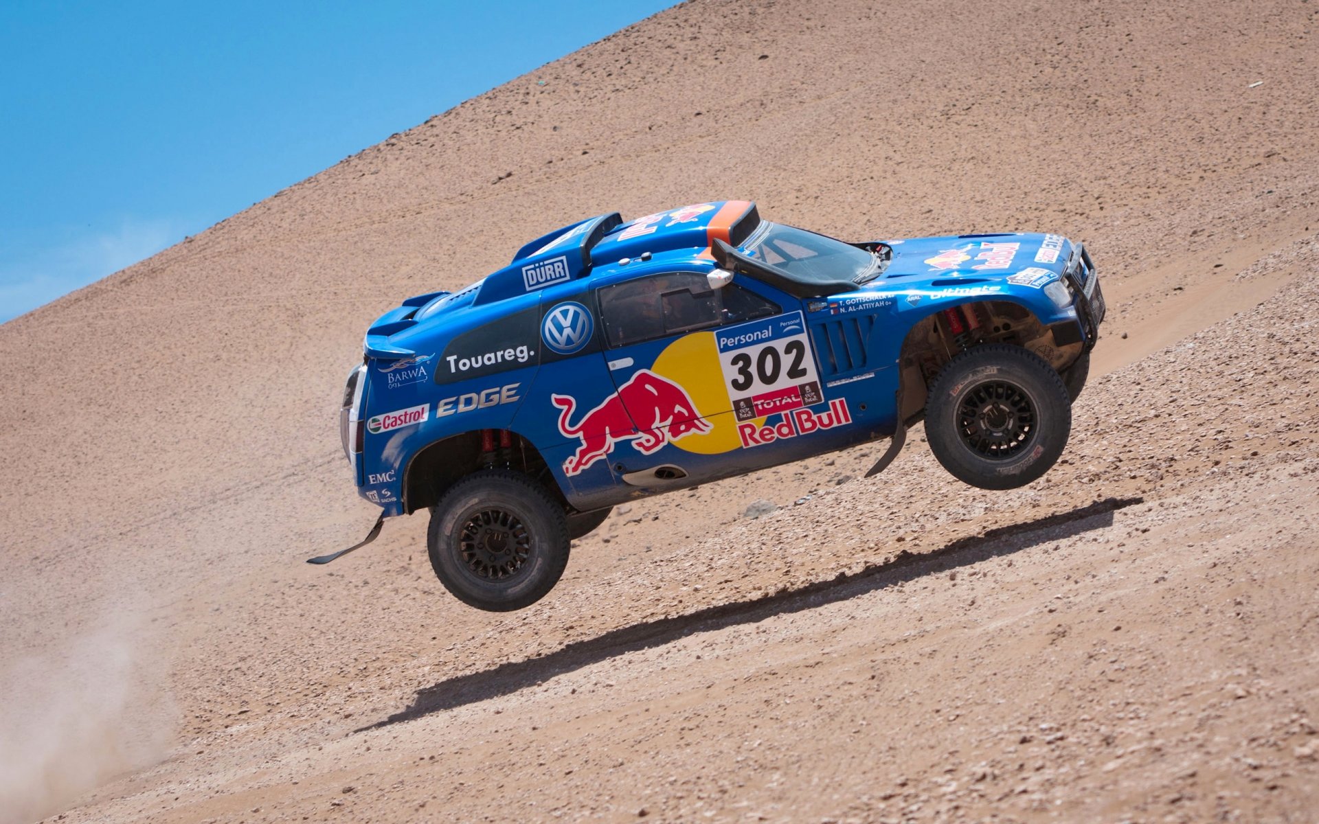 volkswagen tuareg blau dakar rallye rallye in der luft geschwindigkeit roter stier rennen