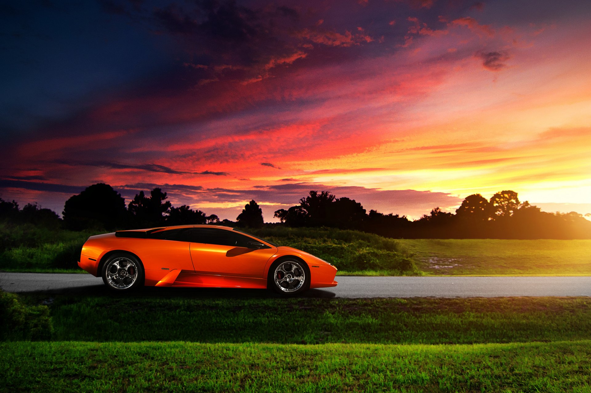 lamborghini murcielago profil orange coucher de soleil ciel éblouissement