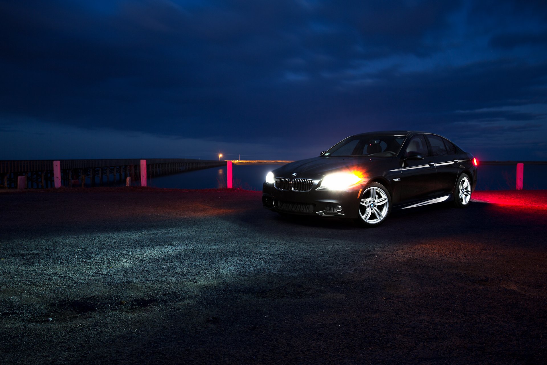 bmw 5 series f10 front black bmw shore pier night glare