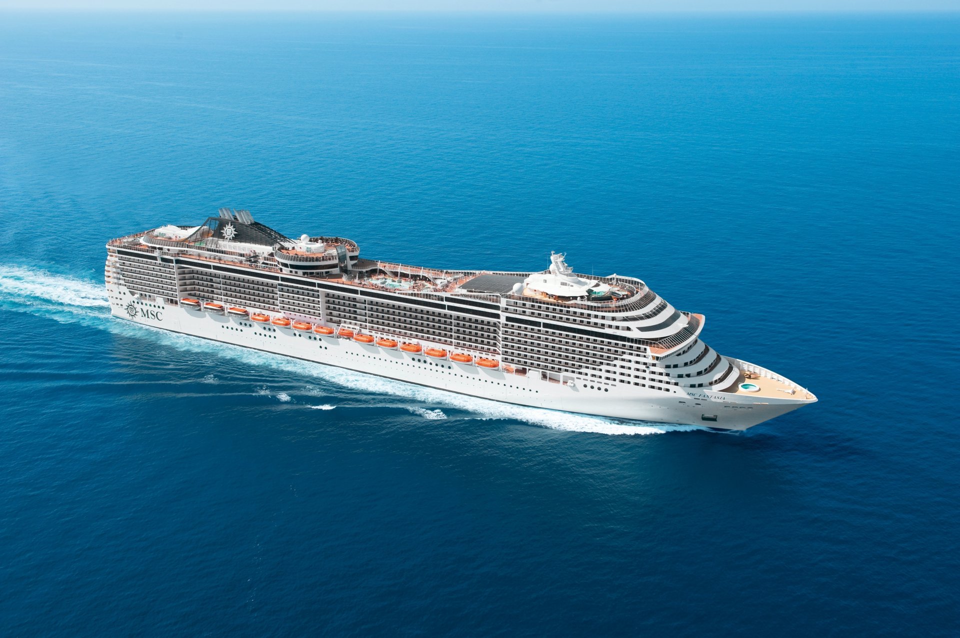 msc fantasia ships liner white on the fly sea water day passenger calm