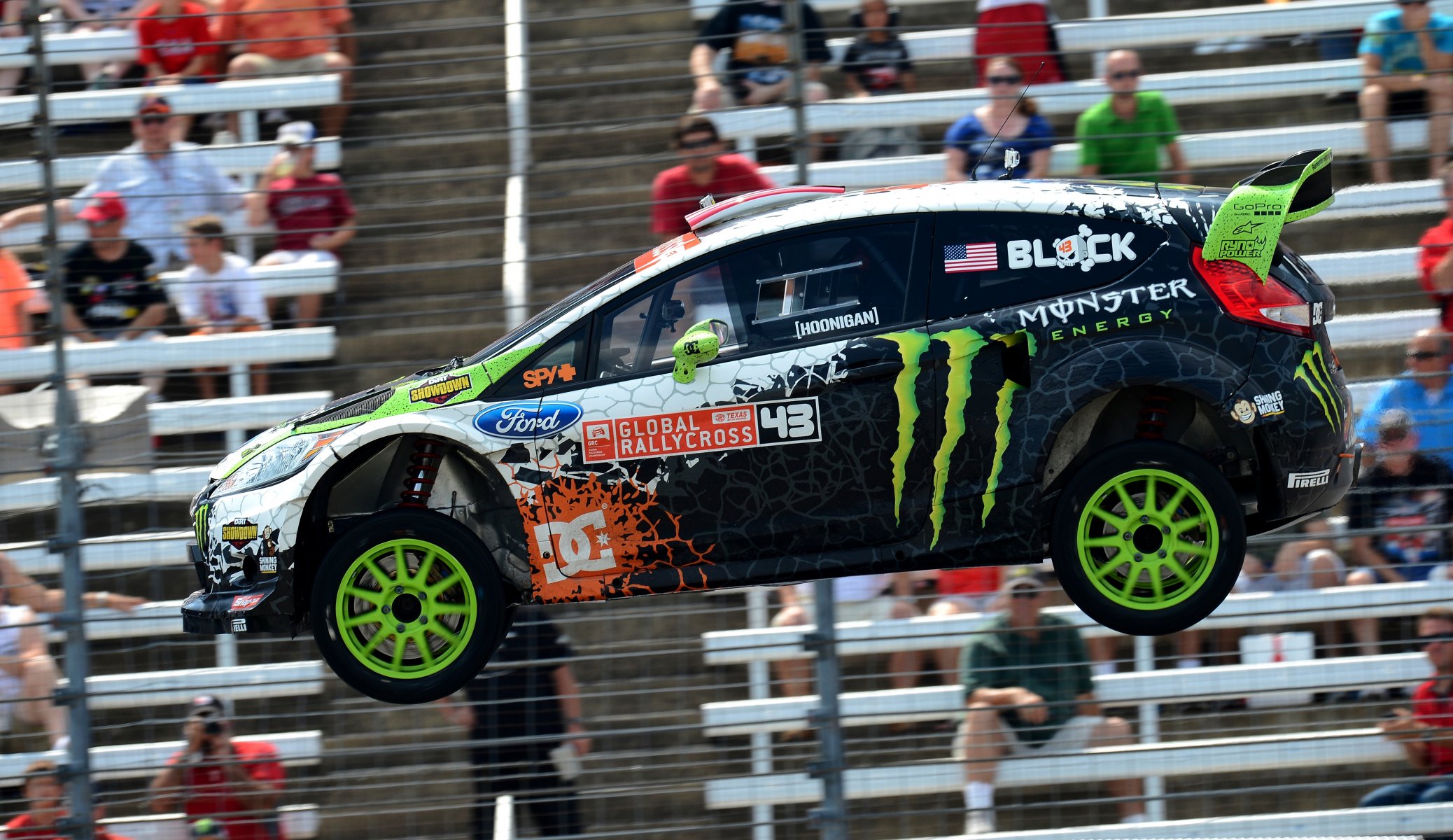 ford fiesta rally ken block rallycross auto fiesta side view in the air speed car people grandstand