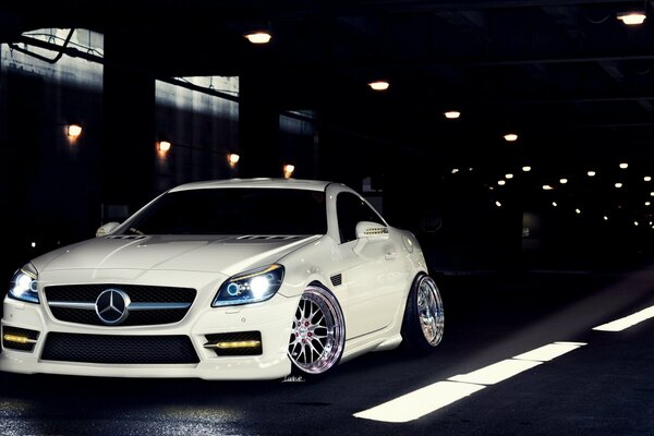 Tuned Mercedes coupe on the road