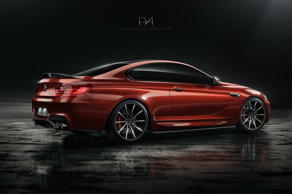 Red bmw m6 on dark neutral background