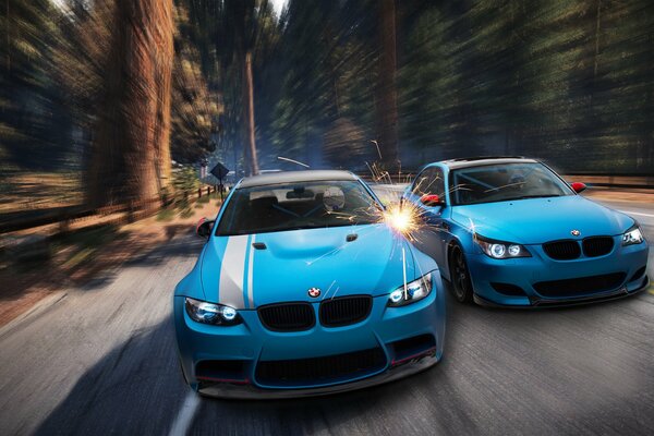 BMW M3 and M5 race in the forest front view