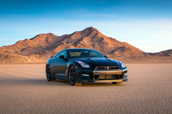 Nissan black among the desert and mountains