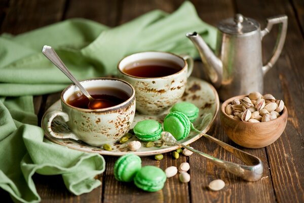 Still life with tea and pistachios