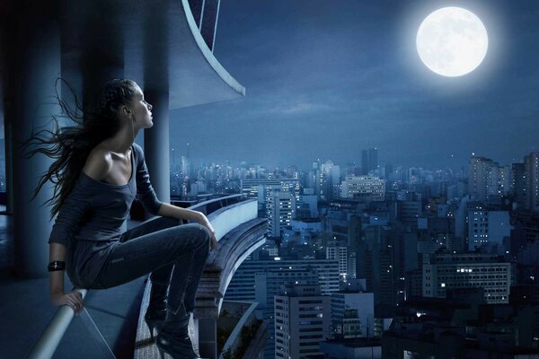 A girl alone looks at the moon