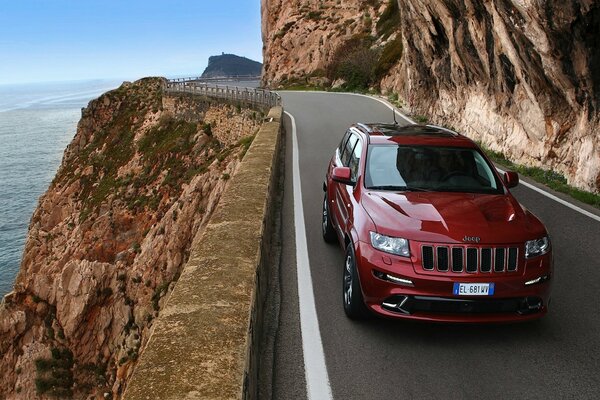 Jeep on the coastal mountain road