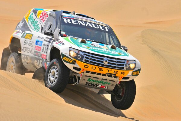 Multicolored Jim Renault SUV in the sands