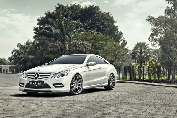 Cityscape with a white Mercedes