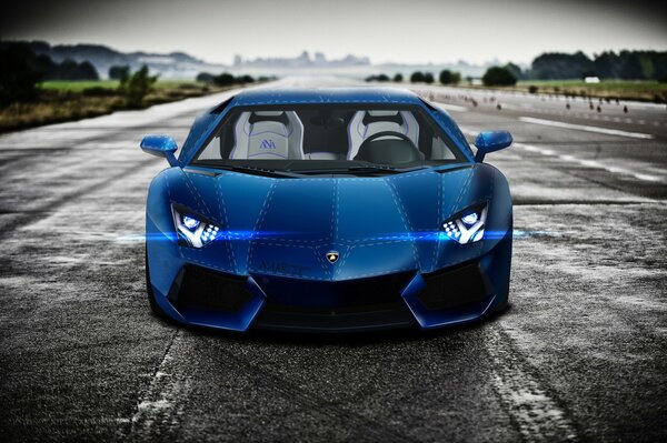 A blue Lamborghini car on a road background