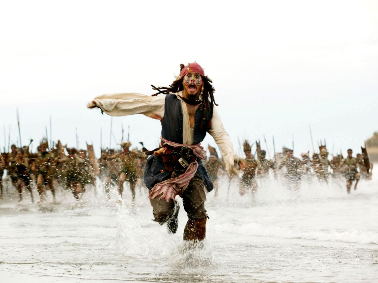 pirates of the caribbean johnny depp jack sparrow running aboriginal people sea