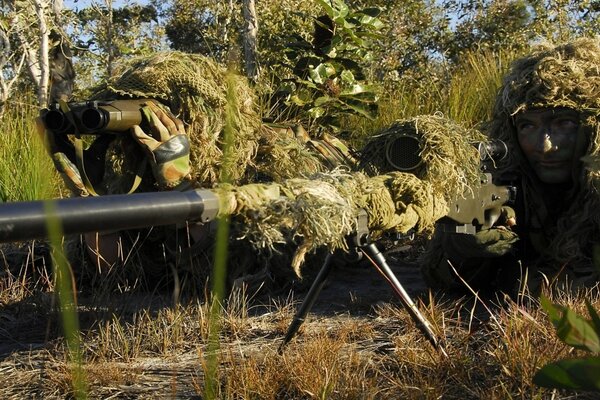 Masked snipers in ambush with weapons