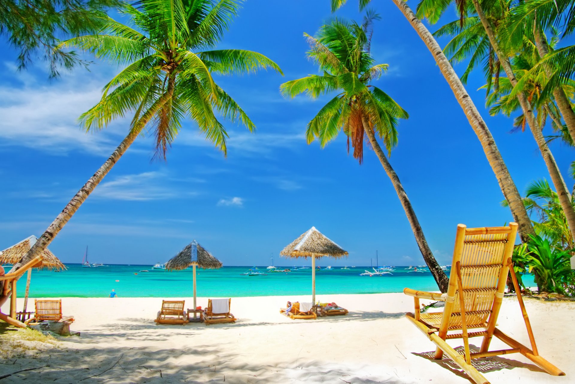 mare spiaggia sabbia palme ombrelloni vacanze