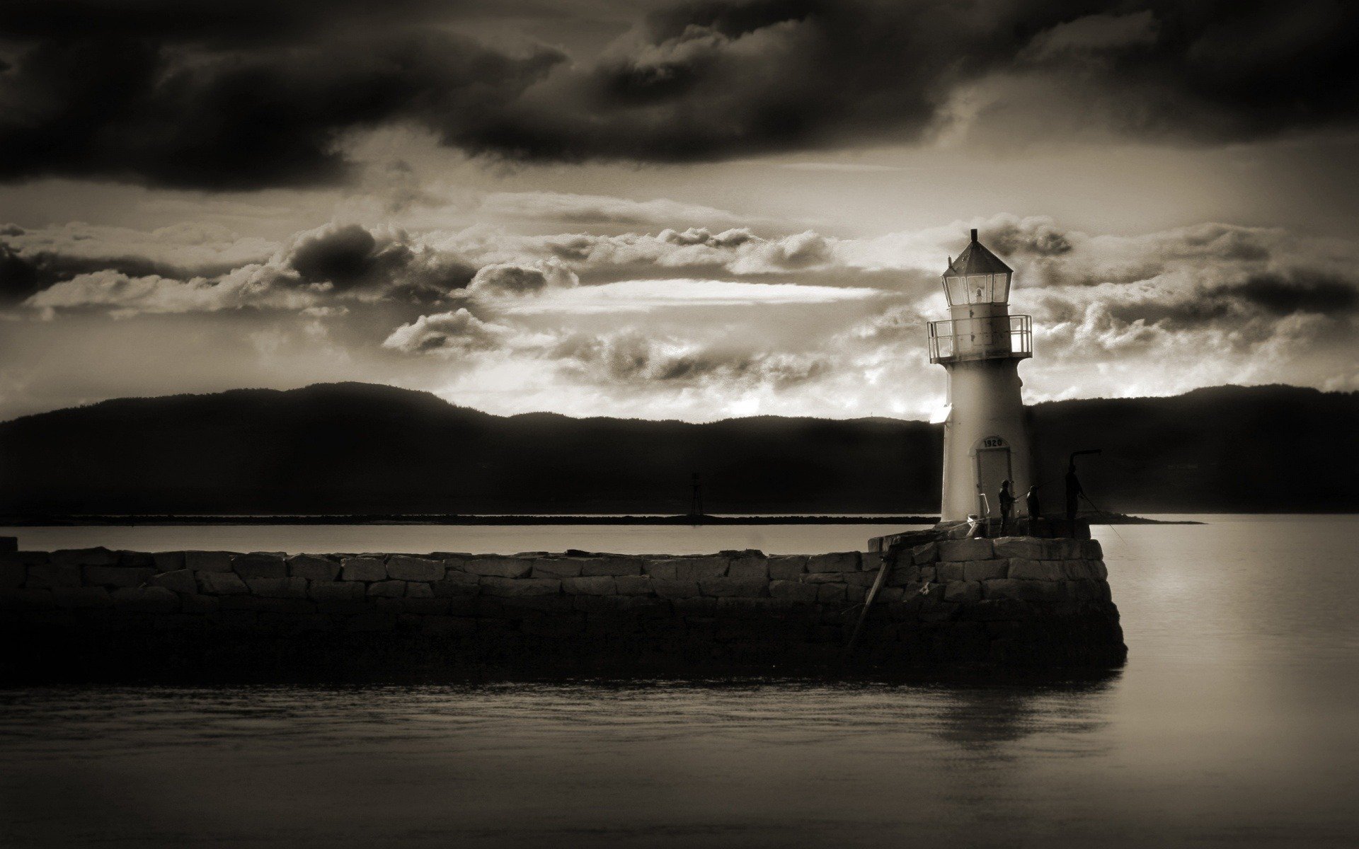 lighthouse water shore clouds clouds black and white