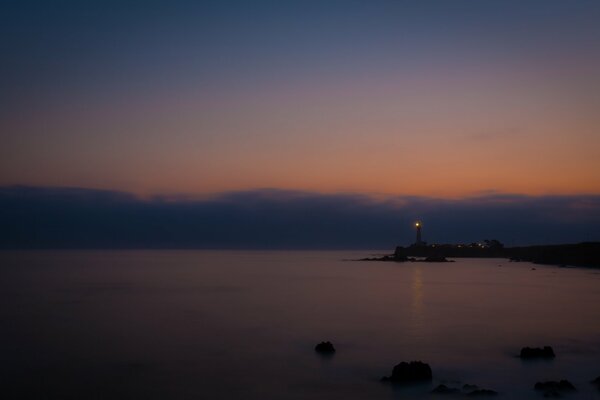 Sea lighthouse at dusk