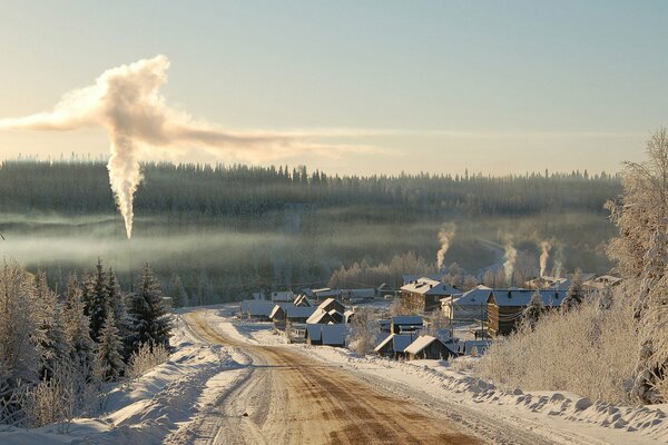 Winterlandschaft Morgen im Dorf