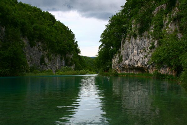 Lake among the rocks in the forest