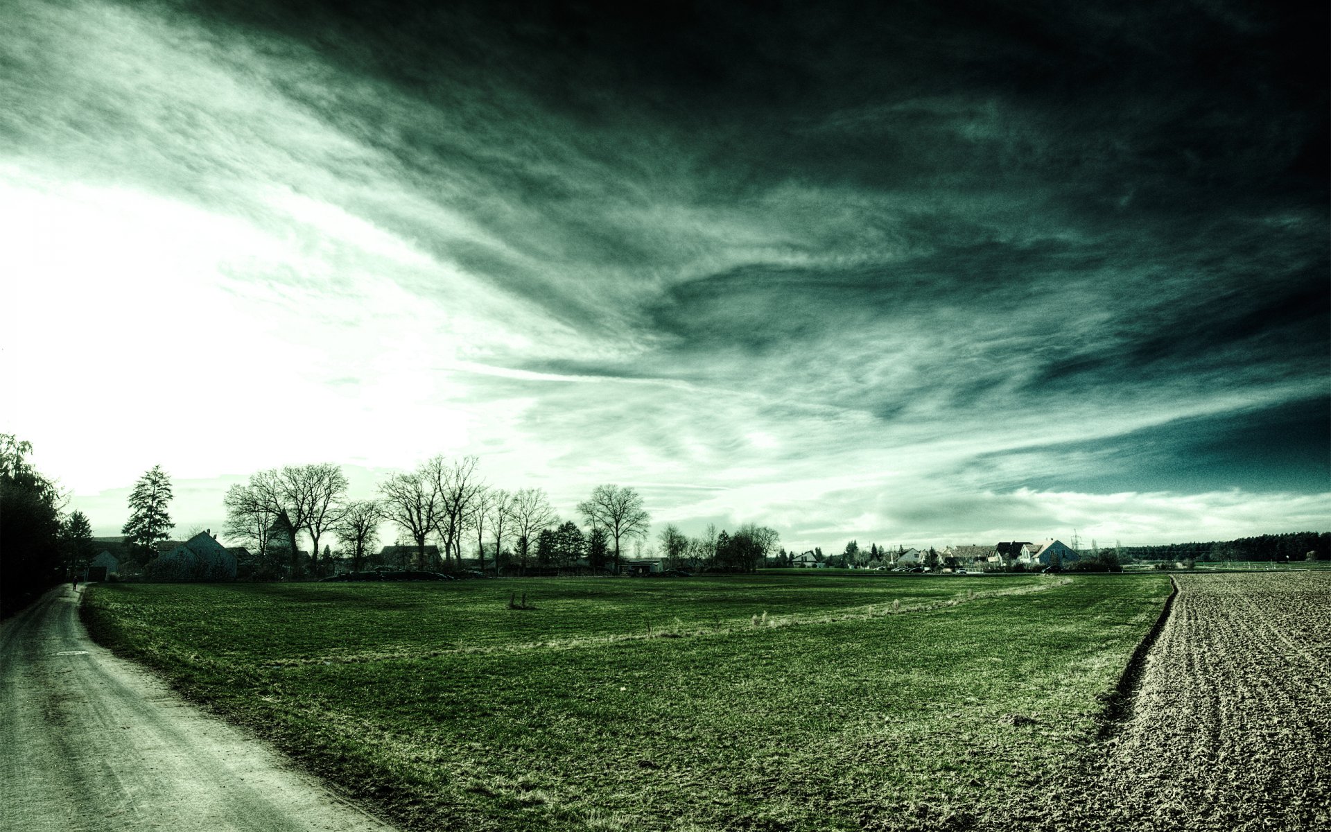 houses roads field landscape sky clouds highway