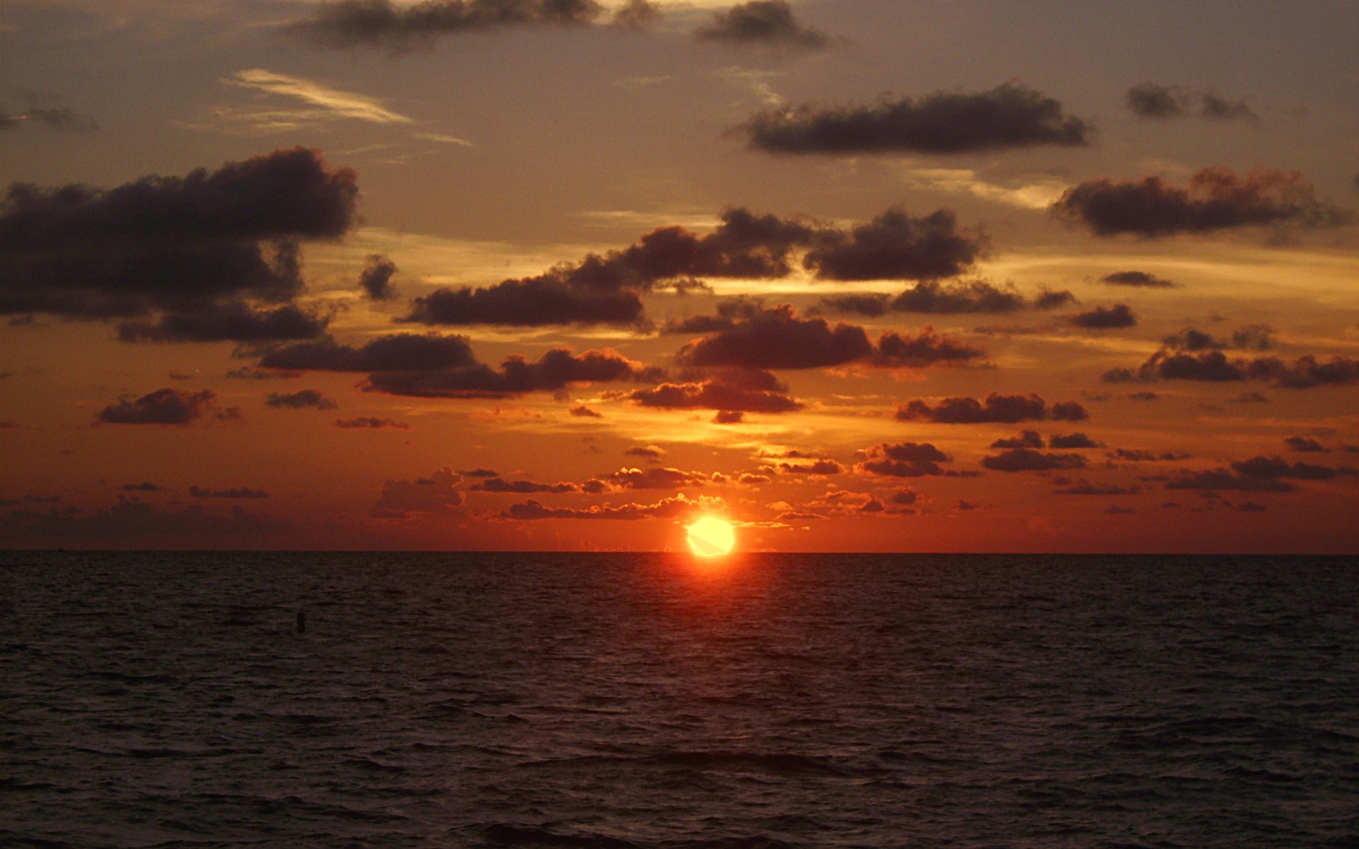 sonnenuntergang meer wolken