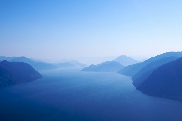 The island of blue mountains and clouds