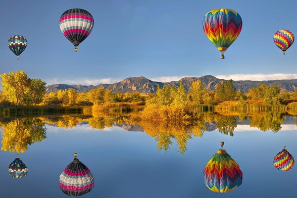 Balloons on the background of a mountain landscape